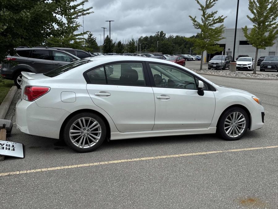 White 2012 Subaru Impreza Sedan All-Wheel Drive Continuously Variable Transmission
